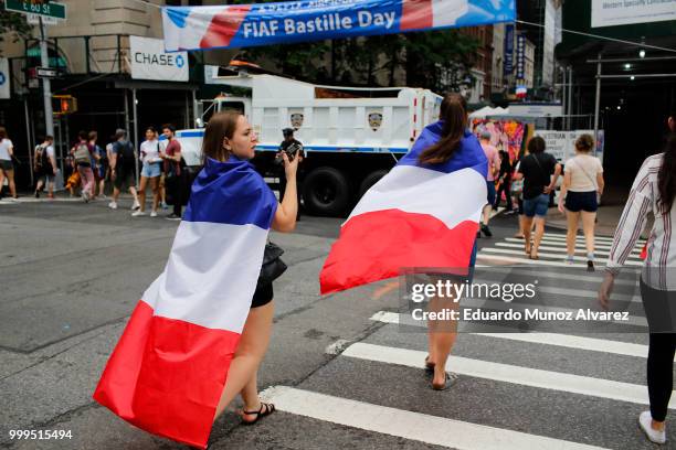 Fans arrive to watch the World Cup final match between France and Croatia on July 15, 2018 in New York City. France is seeking its second World Cup...