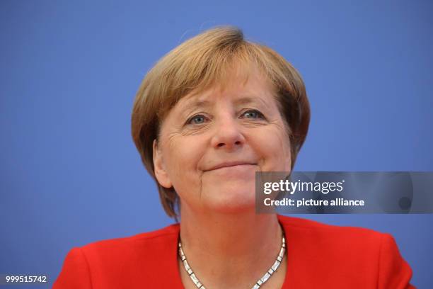 German Chancellor Angela Merkel speaks on current topics of interior and exterior policies at the summer press conference at the federal press...