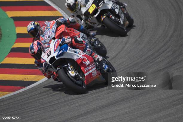 Danilo Petrucci of Italy and Alma Pramac Racing leads the field during the MotoGP race during the MotoGp of Germany - Race at Sachsenring Circuit on...