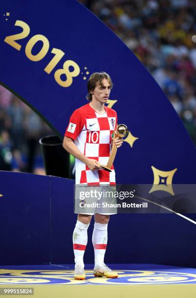 Luka Modric of Croatia receives the adidas Golden Ball award following the 2018 FIFA World Cup Final between France and Croatia at Luzhniki Stadium...