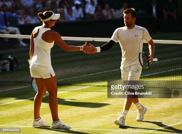 Alexander Peya of Austria and Nicole Melichar of The United States celebrates a point against Jamie Murray of Great Britain and Victoria Azarenka of...