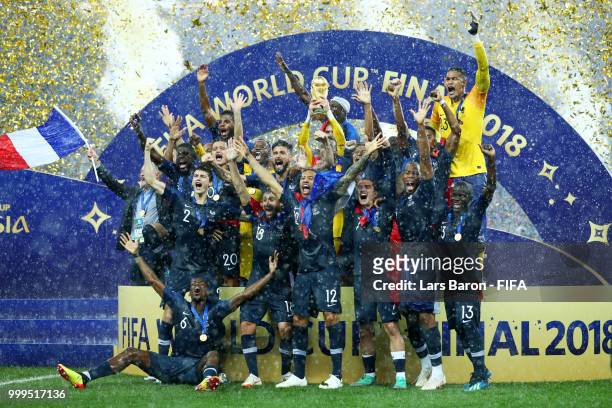Hugo Lloris of France lifts the World Cup trophy to celebrate with his teammates after during the 2018 FIFA World Cup Final between France and...