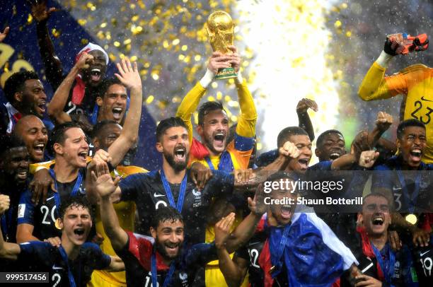 Hugo Lloris of France lifts the World Cup trophy to celebrate with his teammates after the 2018 FIFA World Cup Final between France and Croatia at...