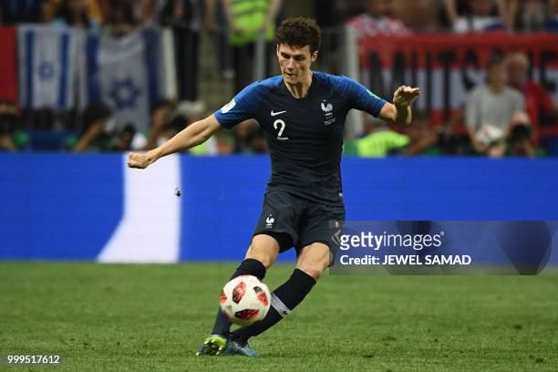 France's defender Benjamin Pavard crosses the ball during the Russia 2018 World Cup final football match between France and Croatia at the Luzhniki...