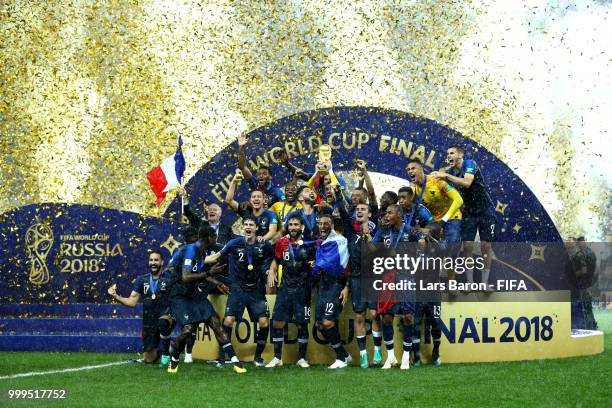 Hugo Lloris of France lifts the World Cup trophy to celebrate with his teammates after the 2018 FIFA World Cup Final between France and Croatia at...