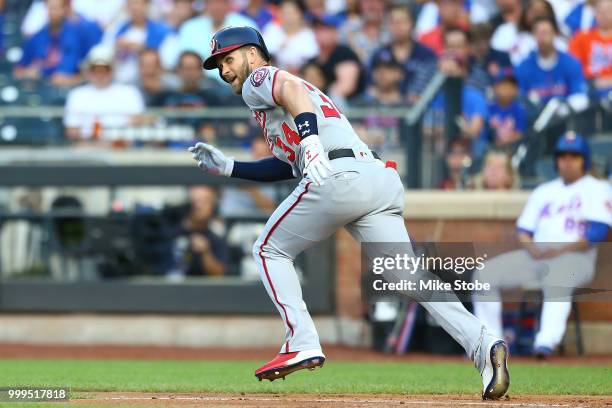 Bryce Harper of the Washington Nationals in action against the New York Mets at Citi Field on July 13, 2018 in the Flushing neighborhood of the...