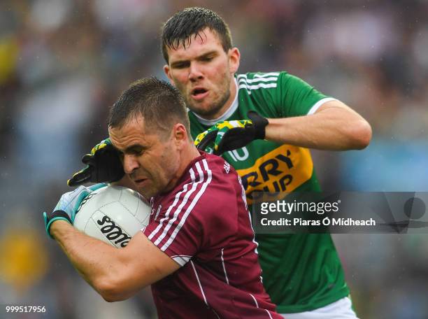 Dublin , Ireland - 15 July 2018; Cathal Sweeney of Galway in action against Kevin McCarthy of Kerry during the GAA Football All-Ireland Senior...