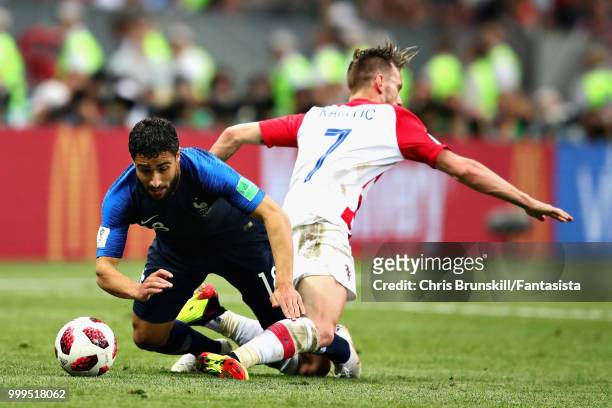 Nabil Fekir of France is challenged by Ivan Rakitic of Croatia during the 2018 FIFA World Cup Russia Final between France and Croatia at Luzhniki...