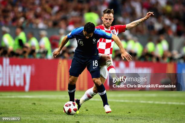 Nabil Fekir of France is challenged by Ivan Rakitic of Croatia during the 2018 FIFA World Cup Russia Final between France and Croatia at Luzhniki...