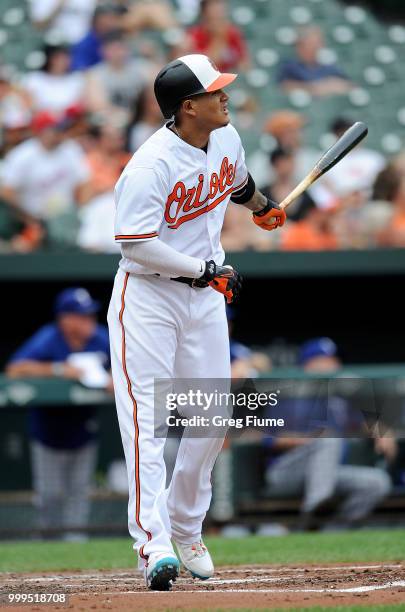 Manny Machado of the Baltimore Orioles hits a home run in the first inning against the Texas Rangers at Oriole Park at Camden Yards on July 15, 2018...
