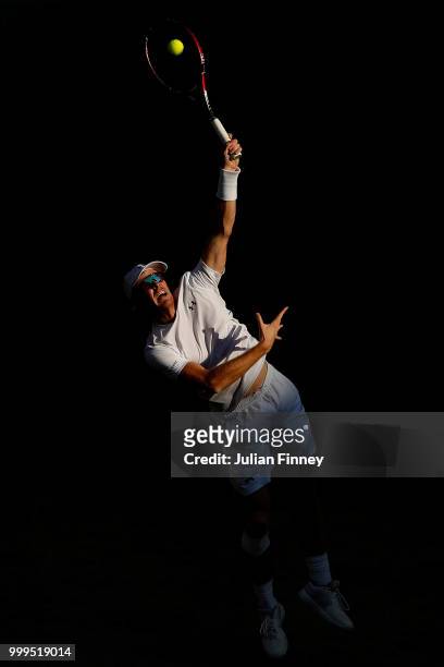 Jamie Murray of Great Britain returns against Alexander Peya of Austria and Nicole Melichar of The United States during the Mixed Doubles final on...