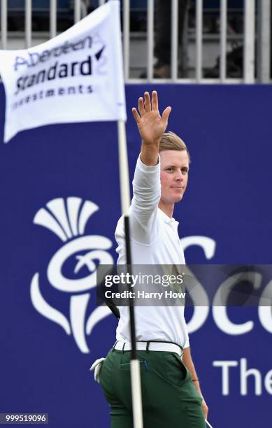 Brandon Stone of South Africa waves to the crowd after finishing his round on 20 shots under par during day four of the Aberdeen Standard Investments...