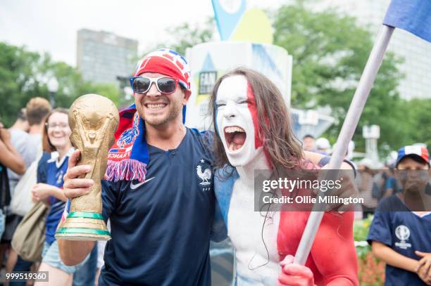 French Canadian football fans react as France win the Russia 2018 World Cup final football match against Croatia outside the Quebec Parliment...