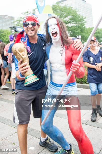 French Canadian football fans react as France win the Russia 2018 World Cup final football match against Croatia outside the Quebec Parliment...