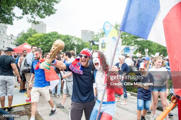 French Canadian football fans react as France win the Russia 2018 World Cup final football match against Croatia outside the Quebec Parliment...