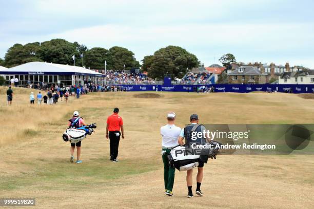 Brandon Stone of South Africa and Dean Burmester of South Africa walk on hole eighteen during day four of the Aberdeen Standard Investments Scottish...