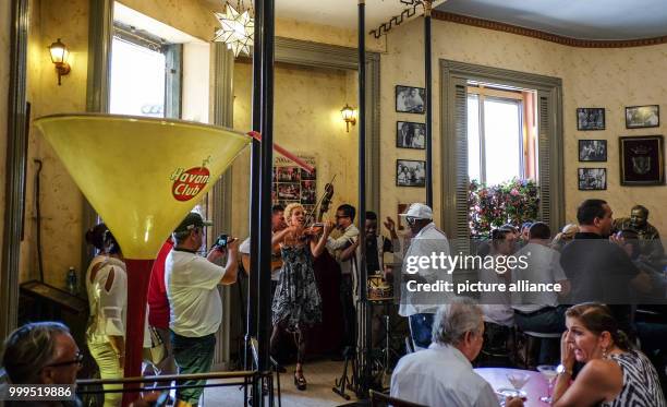 June 2019, Cuba, Havana: A band playing in the bar El Floridita in old town Havana. Daiquiris, a cocktail made of rum, sugar and lemon juice is said...