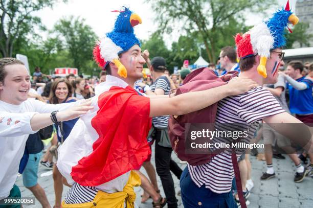 French Canadian football fans react as France win the Russia 2018 World Cup final football match against Croatia outside the Quebec Parliment...