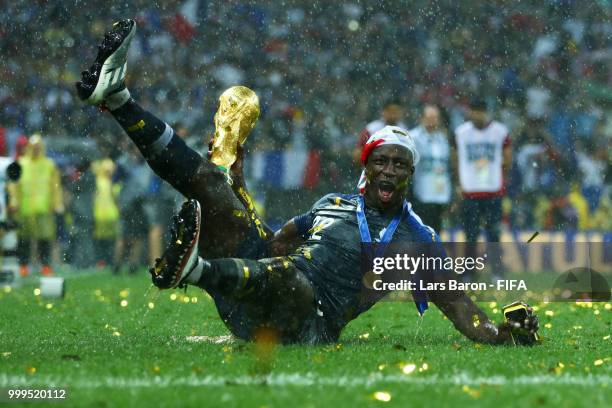 Benjamin Mendy of France celebrates victory with the World Cup trophy following the 2018 FIFA World Cup Final between France and Croatia at Luzhniki...