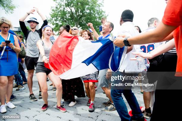 French Canadian football fans react as France win the Russia 2018 World Cup final football match against Croatia outside the Quebec Parliment...