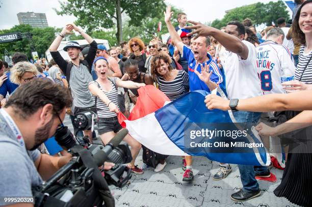 French Canadian football fans react as France win the Russia 2018 World Cup final football match against Croatia outside the Quebec Parliment...