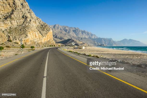 khasab coastal road, musandam, oman - arabian peninsula stock pictures, royalty-free photos & images