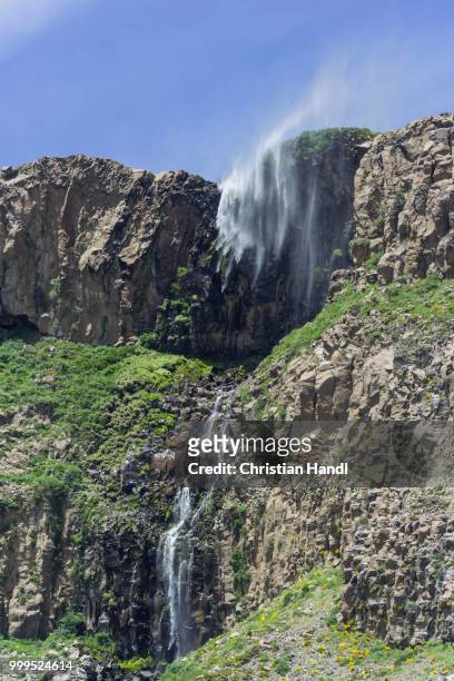 a small waterfall is blown away by the storm, saltos de arco iris, maule valley, san clemente, maule, chile - saldos stock pictures, royalty-free photos & images