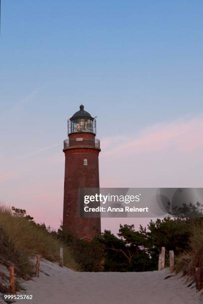 lighthouse in darsser ort in the evening, western pomerania lagoon area national park, near prerow, darss, mecklenburg-western pomerania, baltic sea, germany - pomerania stock pictures, royalty-free photos & images