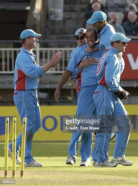 Andrew Symonds of Kent is congratulated by teammates after running out David Hemp of Warwickshire during the Warwickshire Bears v Kent Spitfire...