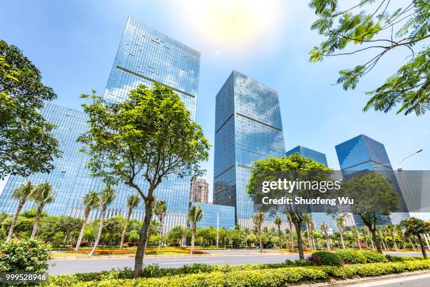 office buildings in the cbd of haikou city - wu stock pictures, royalty-free photos & images