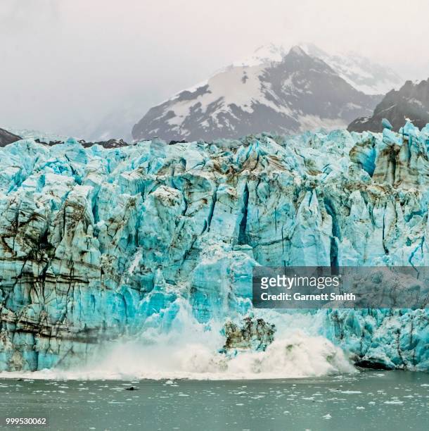 the birth of an iceberg - garnett stock pictures, royalty-free photos & images