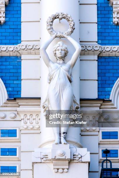 sculpture on the facade of building no. 4 strelnieku iela street, art nouveau, riga, latvia - nouveau stock pictures, royalty-free photos & images