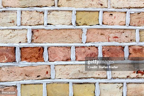 brick wall, riga, latvia - kiefer foto e immagini stock