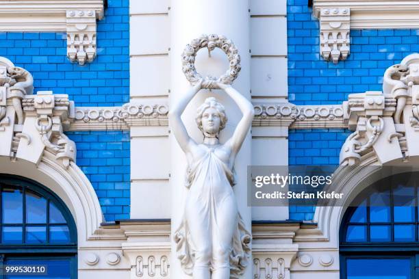 sculpture on the facade of building no. 4 strelnieku iela street, art nouveau, riga, latvia - embellishment bildbanksfoton och bilder