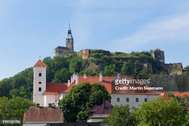 monastery church and burg guessing castle, stremtal valley, southern burgenland, burgenland, austria - burg stock pictures, royalty-free photos & images