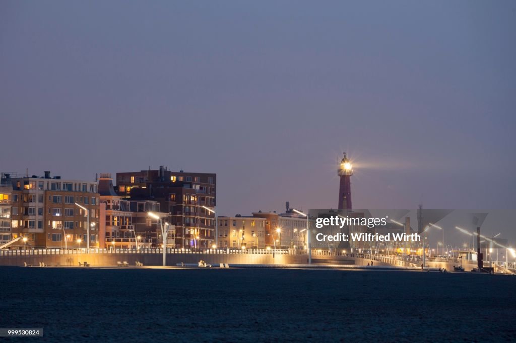 Beach promenade with lighthouse, Scheveningen, The Hague, Holland, The Netherlands