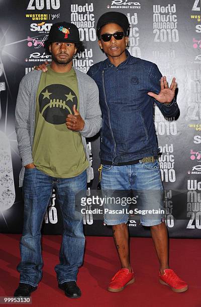 Musician Pharrell Williams and guest attends the World Music Awards 2010 at the Sporting Club on May 18, 2010 in Monte Carlo, Monaco.