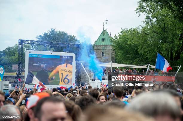 French Canadian football fans react as France win the Russia 2018 World Cup final football match against Croatia outside the Quebec Parliment...