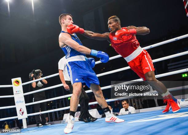 The German boxer Ibragim Bazuev fights against the Cuban boxer Julio La Cruz in the cruiser weight class during the Ameteur's Boxing World...