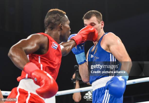 The German boxer Ibragim Bazuev fights against the Cuban boxer Julio La Cruz in the cruiser weight class during the Ameteur's Boxing World...