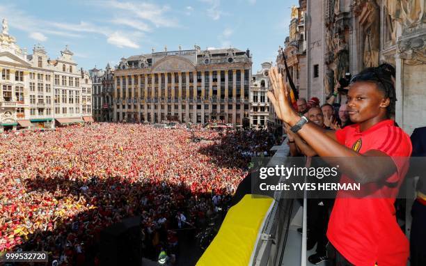 Belgium's Dedryck Boyata celebrates at the balcony in front of more than 8000 supporters at the Grand-Place, Grote Markt in Brussels city center, as...