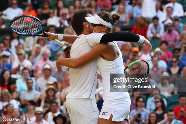 Alexander Peya of Austria and Nicole Melichar of The United States celebrate match point against Jamie Murray of Great Britain and Victoria Azarenka...