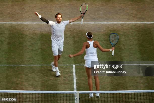 Alexander Peya of Austria and Nicole Melichar of The United States celebrate match point against Jamie Murray of Great Britain and Victoria Azarenka...