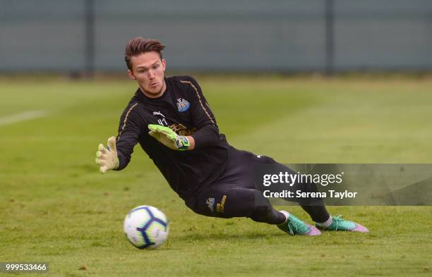 Goalkeeper Freddie Woodman dives for the ball during the Newcastle United Training session at Carton House on July 15 in Kildare, Ireland.