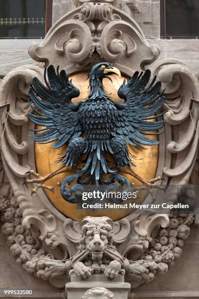 imperial eagle, portal of the old town hall, 1616-1622, nuremberg, middle franconia, bavaria, germany - tierfigur stock-fotos und bilder
