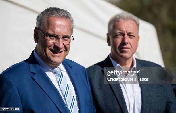 The Bavarian interior minister Joachim Herrmann and his Czech colleague Milan Chovanec can be seen watching the joint cross-border drill involving...