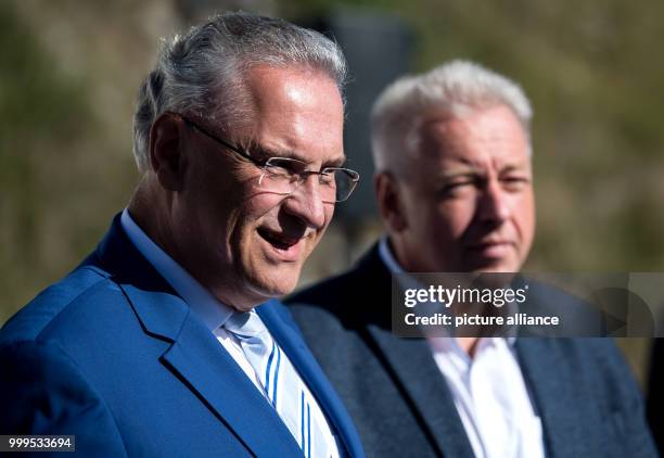 The Bavarian interior minister Joachim Herrmann and his Czech colleague Milan Chovanec can be seen watching the joint cross-border drill involving...