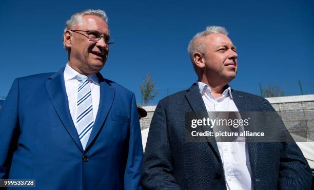 The Bavarian interior minister Joachim Herrmann and his Czech colleague Milan Chovanec can be seen watching the joint cross-border drill involving...