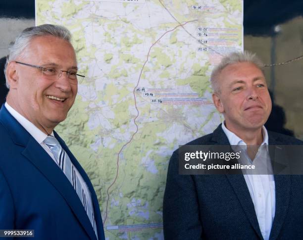 The Bavarian interior minister Joachim Herrmann and his Czech colleague Milan Chovanec can be seen watching the joint cross-border drill involving...