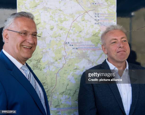 The Bavarian interior minister Joachim Herrmann and his Czech colleague Milan Chovanec can be seen watching the joint cross-border drill involving...